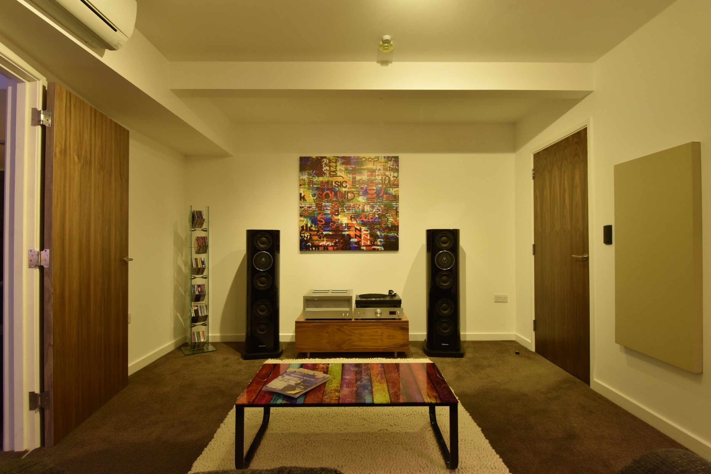 Media Room with audio hi-fi equipment including turntable, amplifier and floor-standing speakers