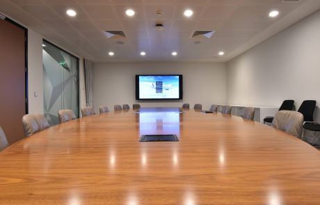 Avensys Commercial boardroom with lighting, screen and audio