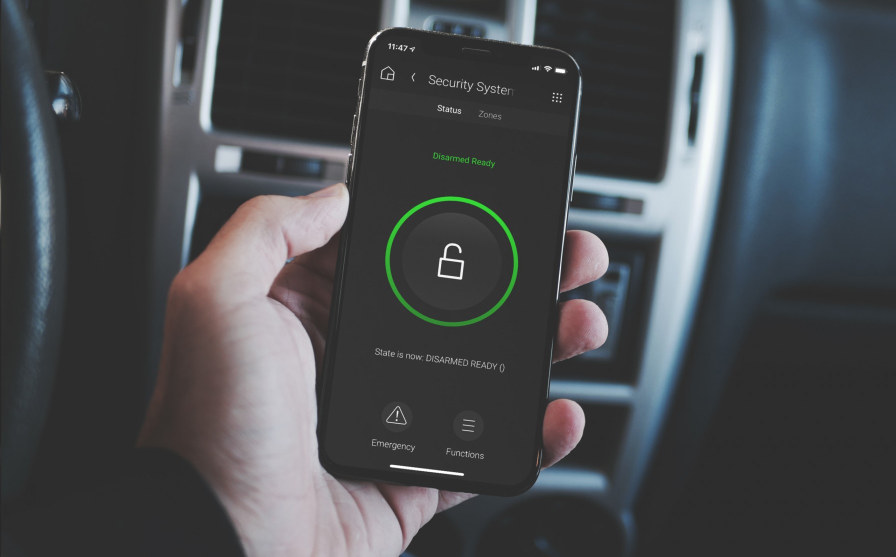 Security & Access 1 Phone being held with security system functions being remotely controlled