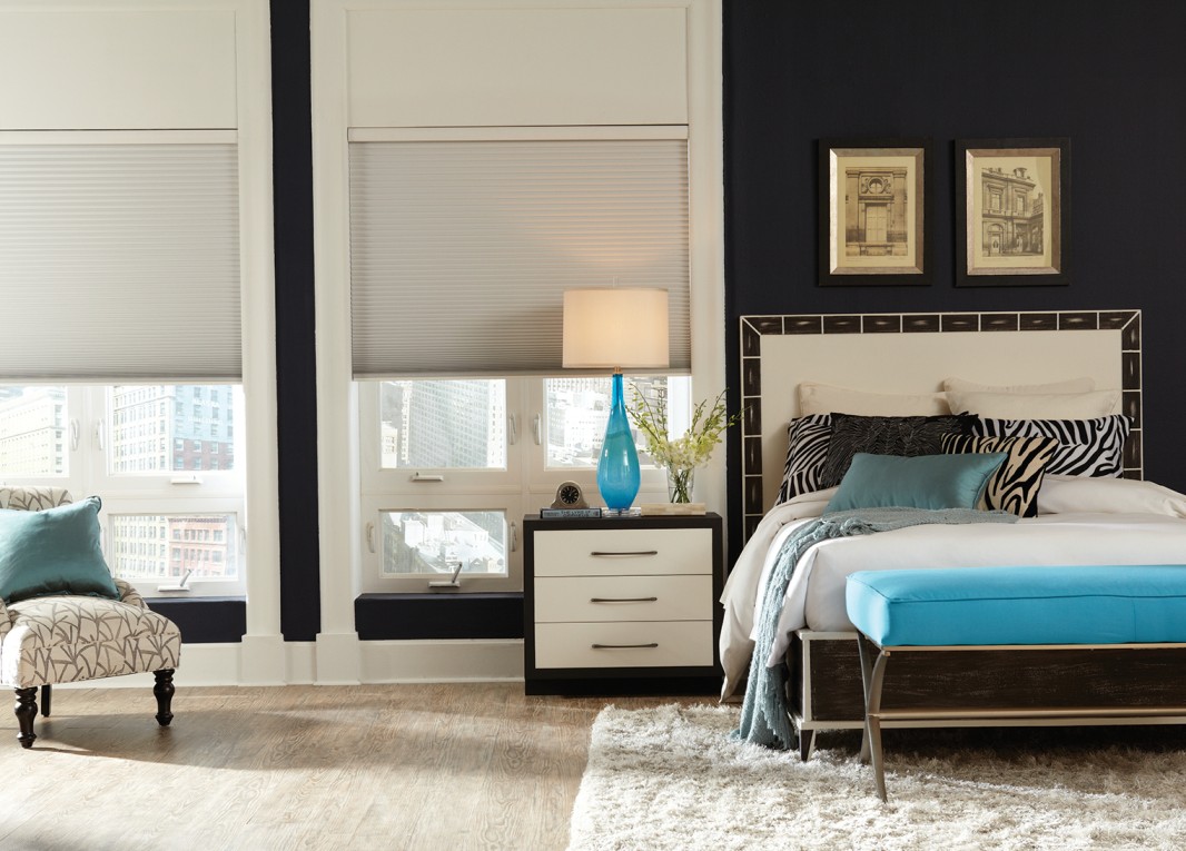 Bedroom space showcasing motorised blinds