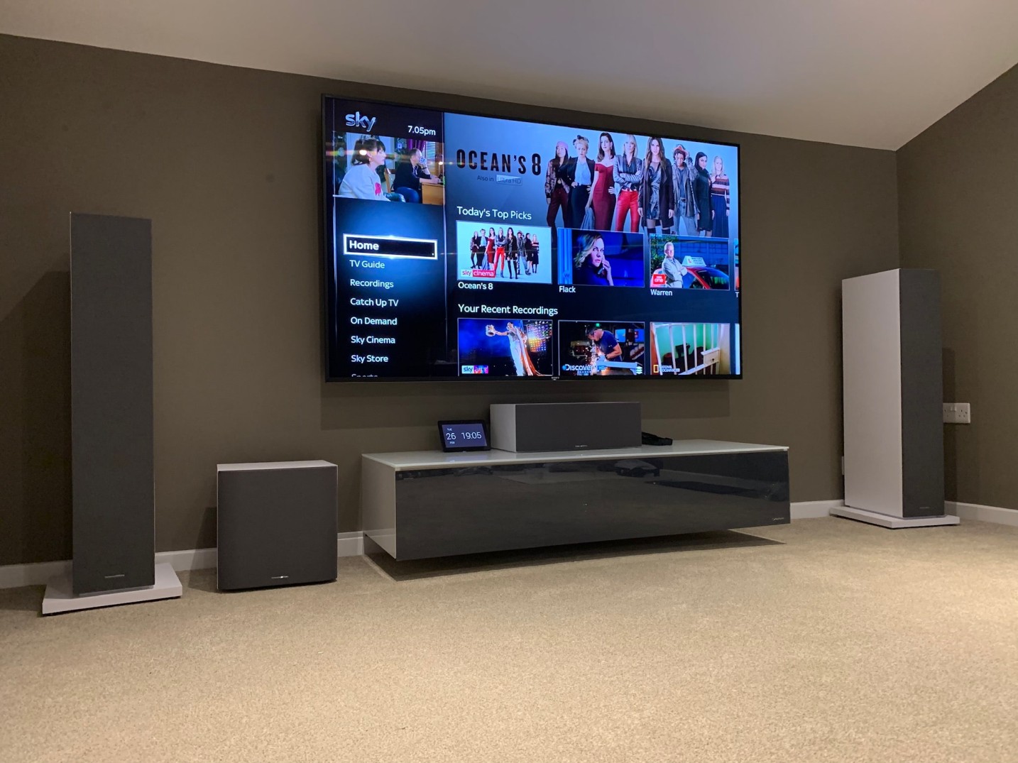 Home Cinema 1 Home cinema set-up with multi-channel speaker system, Control4 panel and 4K TV