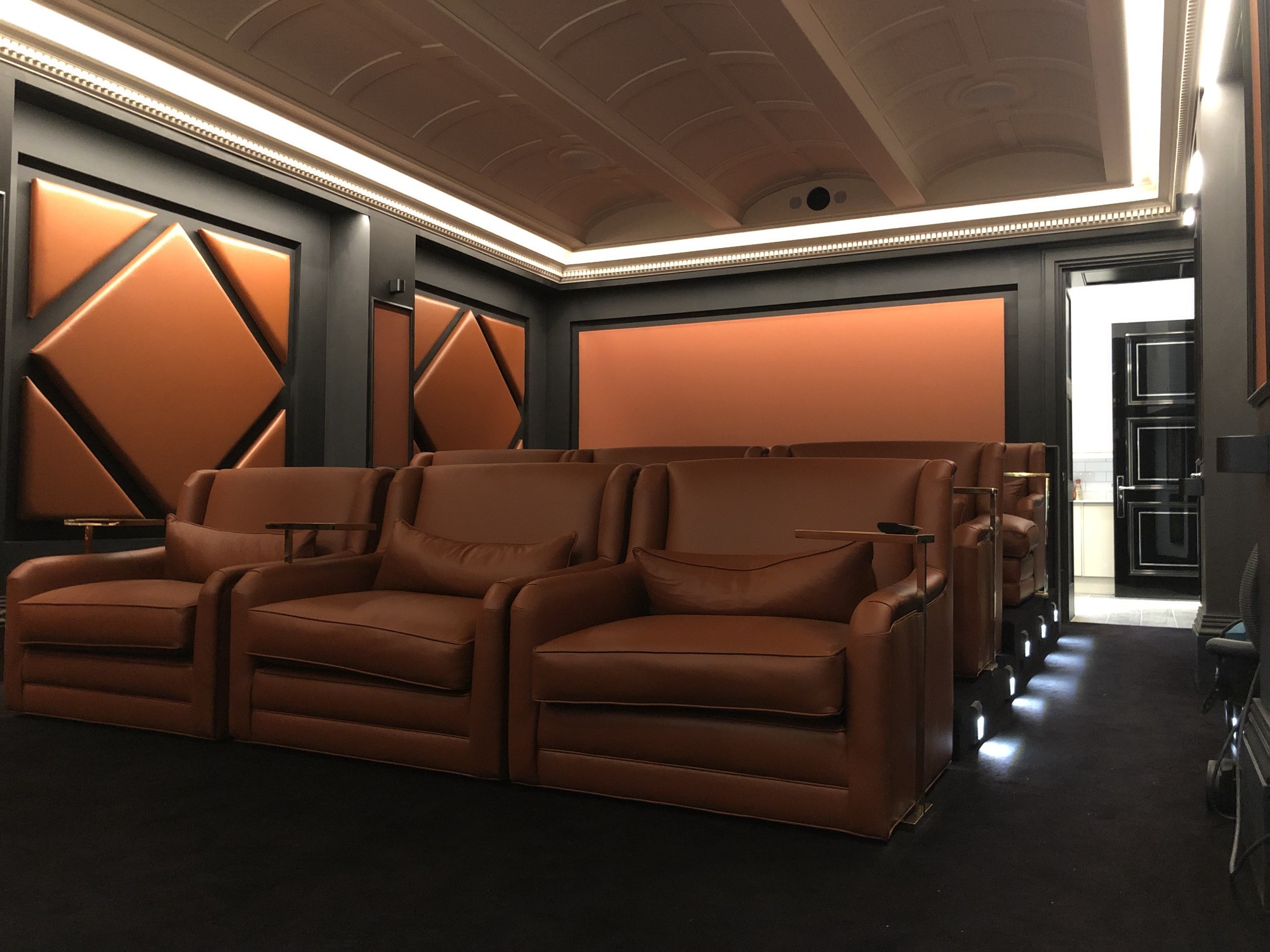 Home Cinema room showcasing lighting, projector and cinema chairs