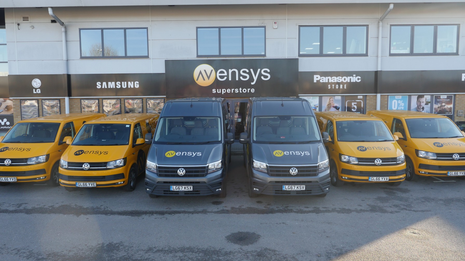 Front of Avensys House building with vans out front