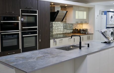kitchen showroom with built-in appliances and Quooker tap on a work top